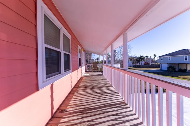 balcony featuring a residential view and a porch