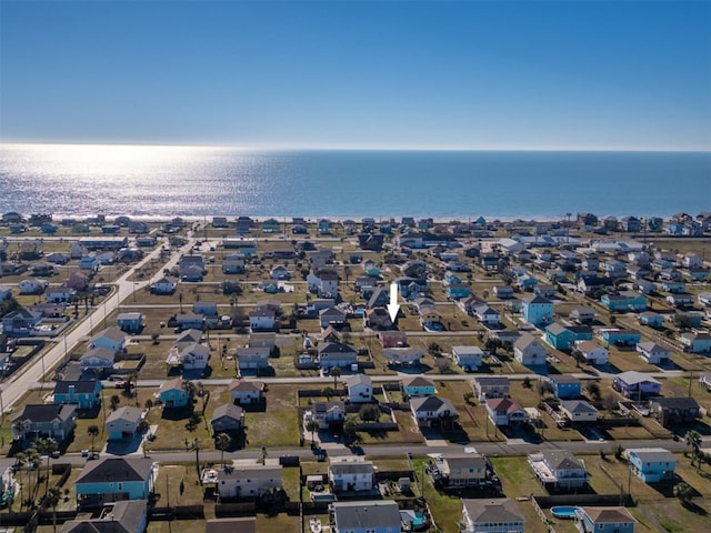 birds eye view of property with a residential view and a water view