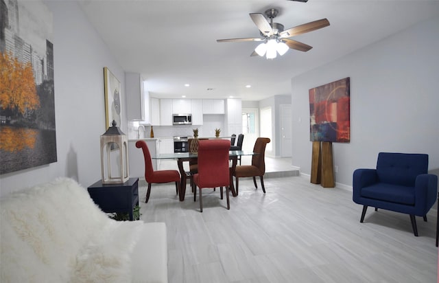 dining area with ceiling fan