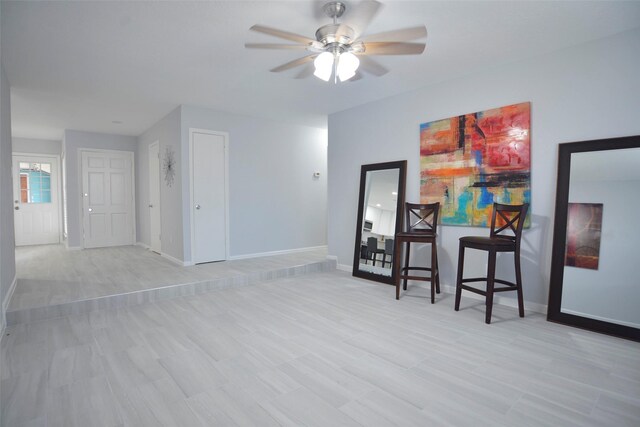 spare room with ceiling fan