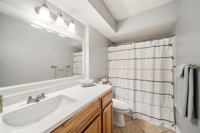 bathroom with walk in shower, tile patterned flooring, vanity, and toilet