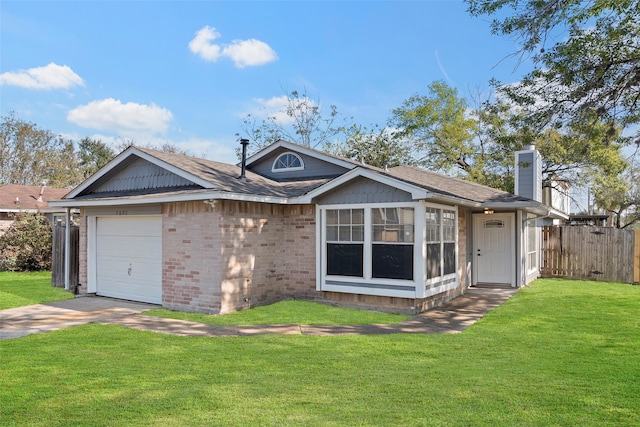 ranch-style house featuring a garage and a front lawn