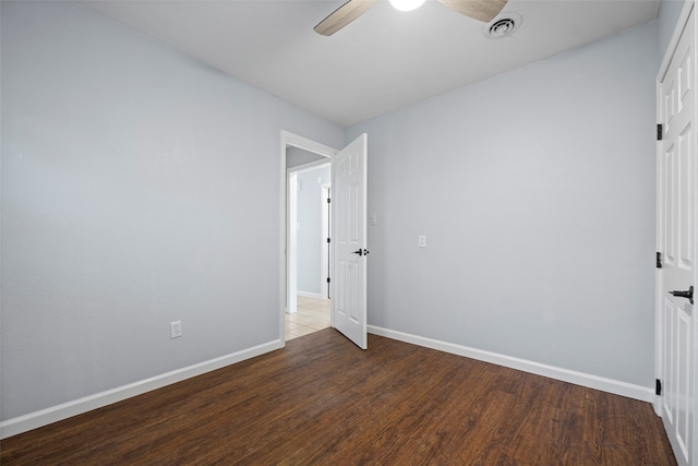 unfurnished bedroom featuring hardwood / wood-style floors and ceiling fan