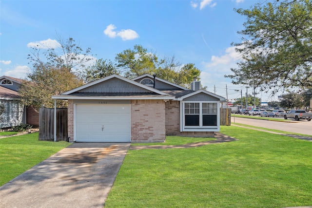 view of front of house featuring central AC, a garage, and a front lawn