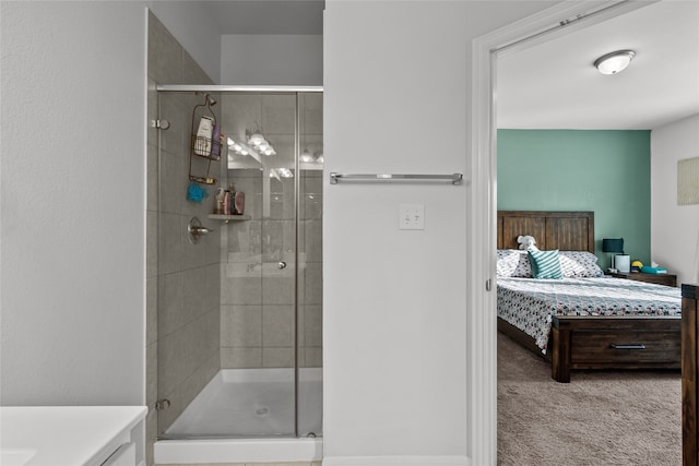 bathroom with vanity and an enclosed shower