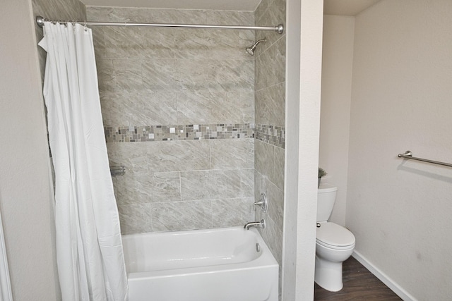 bathroom with toilet, shower / bathtub combination with curtain, and hardwood / wood-style flooring