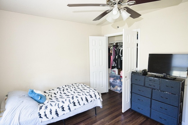 bedroom featuring a closet, ceiling fan, and dark wood-type flooring