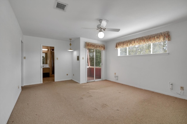 carpeted empty room with ceiling fan