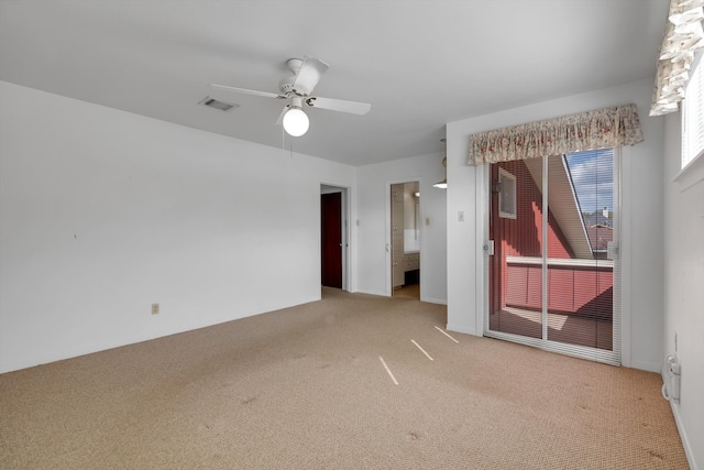 carpeted empty room with ceiling fan