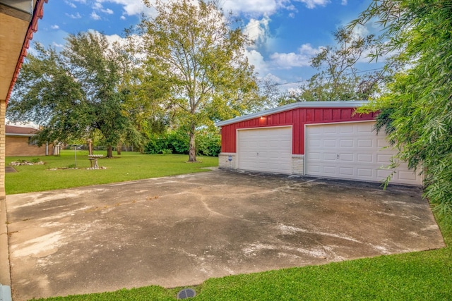 garage with a lawn