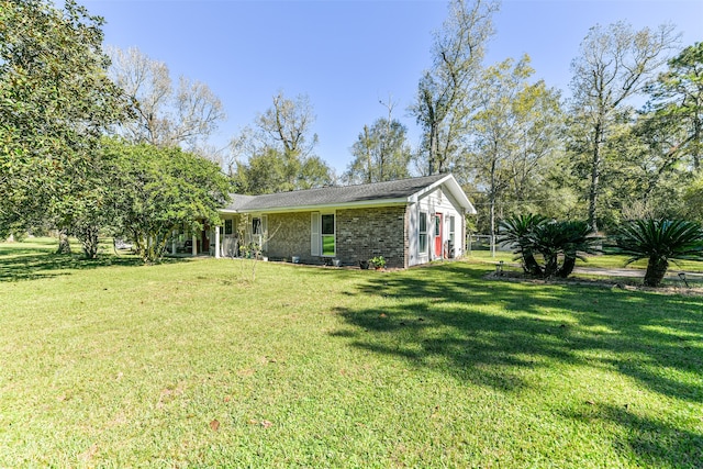 exterior space with a front lawn