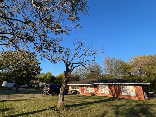 exterior space featuring a front lawn