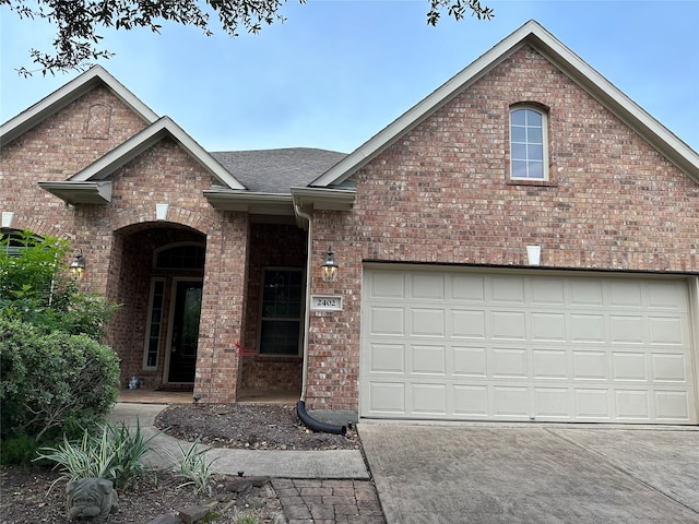 view of front of home featuring a garage