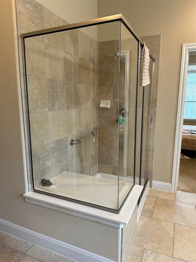 bathroom with an enclosed shower