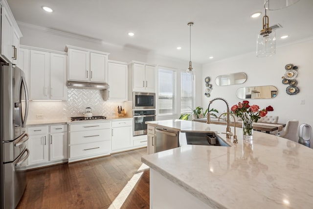 kitchen featuring white cabinets, light stone countertops, sink, and appliances with stainless steel finishes