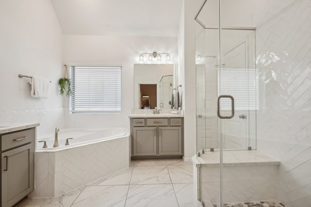 bathroom with vanity and plus walk in shower