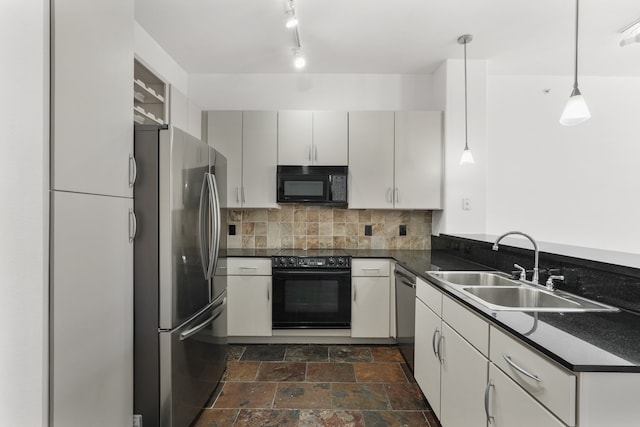 kitchen with white cabinetry, sink, hanging light fixtures, backsplash, and black appliances