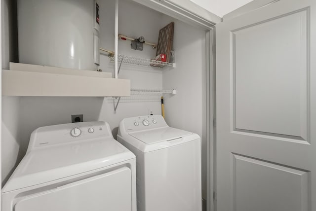 laundry room with washer and dryer