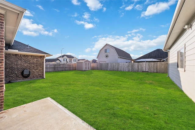 view of yard with a patio area and a shed