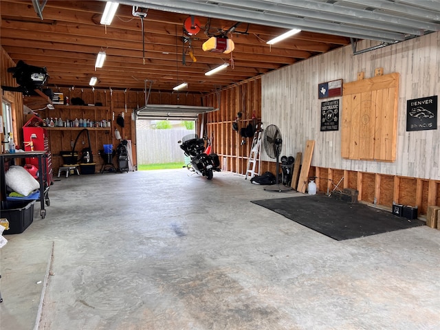 garage featuring a garage door opener