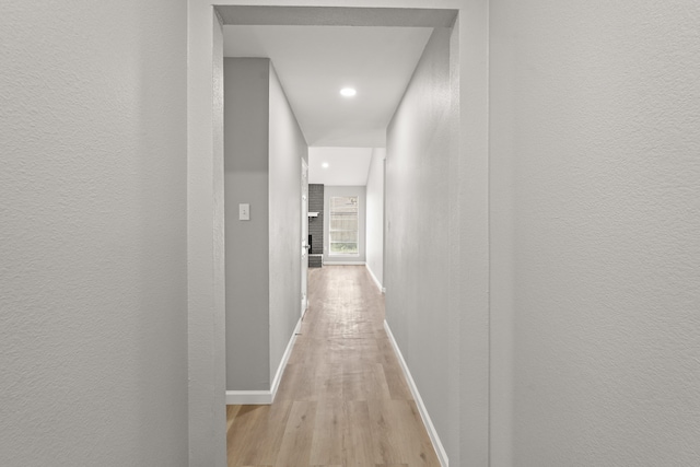 hall featuring light wood-type flooring