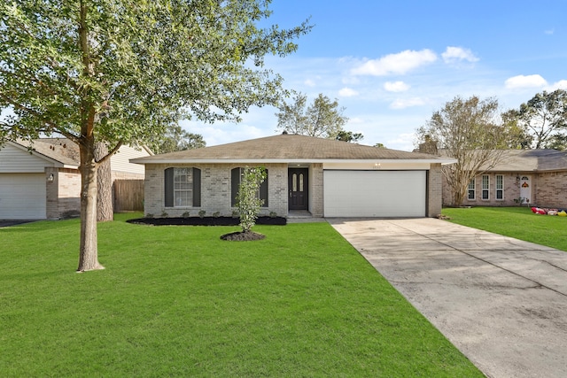 ranch-style home with a front yard and a garage