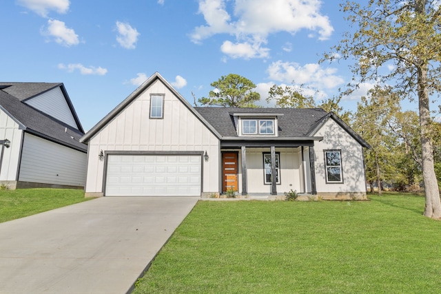 modern inspired farmhouse with a front lawn and a garage