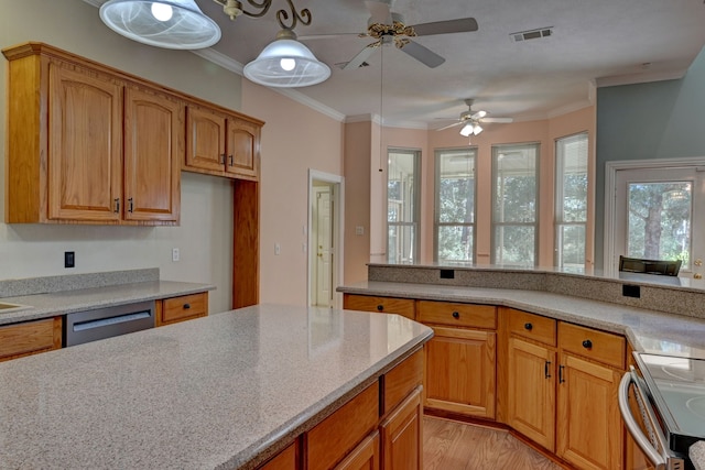 kitchen with ceiling fan, stainless steel appliances, light stone counters, ornamental molding, and light wood-type flooring