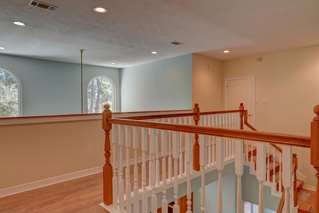 hallway with light wood-type flooring