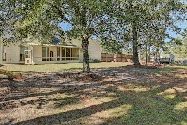 view of yard with a sunroom