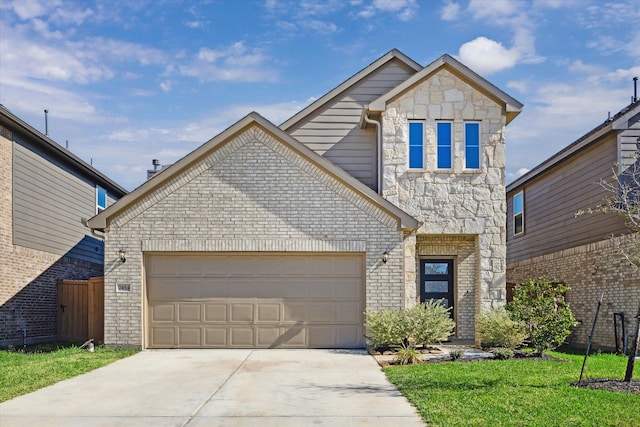 front of property featuring a front yard and a garage