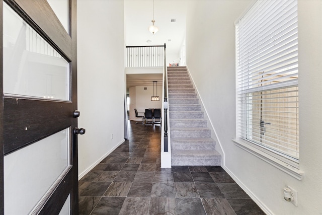 foyer with a high ceiling