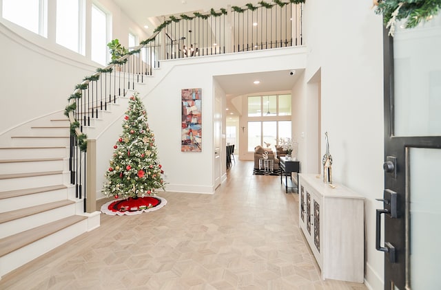 foyer featuring a high ceiling