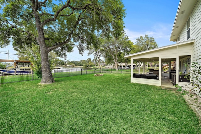 view of yard with a sunroom