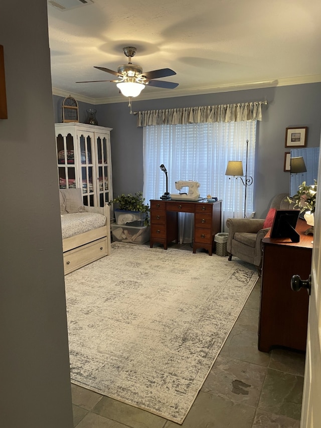 bedroom featuring crown molding and ceiling fan