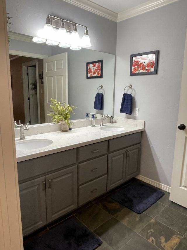 bathroom with tile patterned flooring, vanity, and ornamental molding