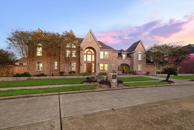 view of front of home featuring a yard