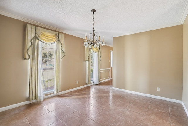 tiled empty room with crown molding, a chandelier, and a textured ceiling