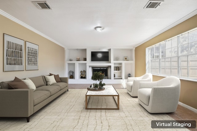 living room featuring light tile patterned floors, crown molding, and built in shelves