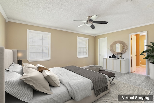 carpeted bedroom featuring ceiling fan, crown molding, and a textured ceiling