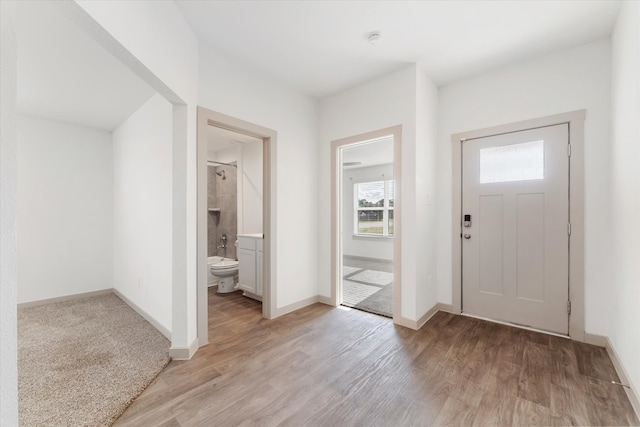 entrance foyer featuring light hardwood / wood-style floors