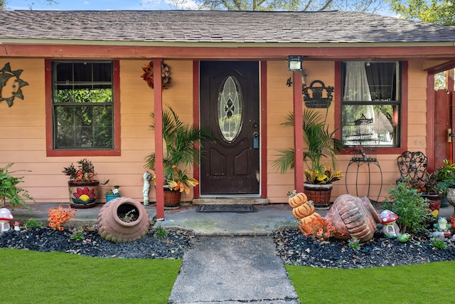 property entrance with covered porch