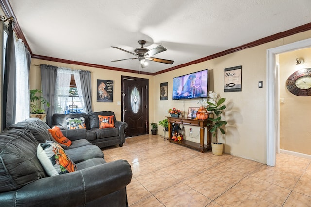 living room with a textured ceiling, ceiling fan, light tile patterned floors, and crown molding