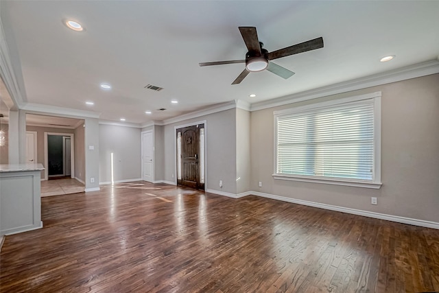 unfurnished living room featuring ceiling fan, wood-type flooring, and ornamental molding