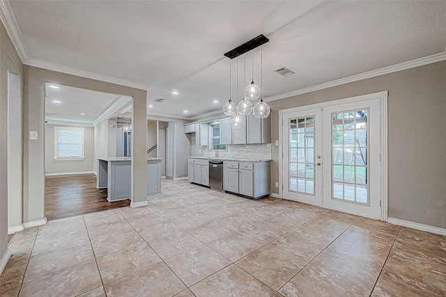 kitchen featuring french doors, stainless steel dishwasher, backsplash, crown molding, and gray cabinets