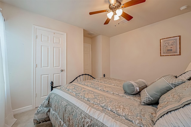 bedroom featuring visible vents, ceiling fan, baseboards, and carpet