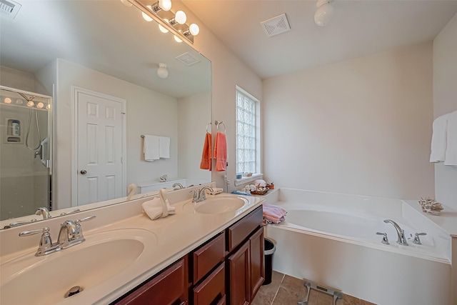 full bathroom featuring a sink, visible vents, a bath, and a shower stall