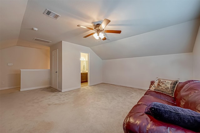 interior space with light carpet, visible vents, baseboards, and a ceiling fan