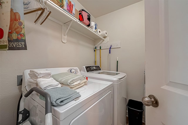 clothes washing area featuring laundry area and independent washer and dryer