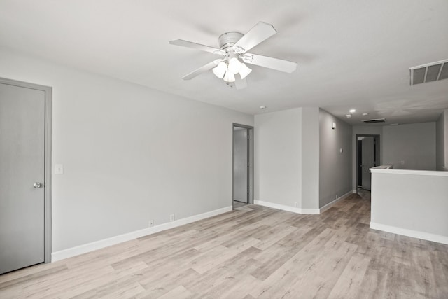 unfurnished room with light hardwood / wood-style floors and ceiling fan